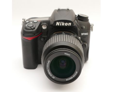A Nikon D7000 DSLR camera with a Nikon AF-S f/3.5-5.6 18-55mm lens.