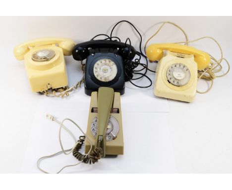 Four vintage GPO/ British Telecom rotary telephones in various colours, one being wall mounted. (4)