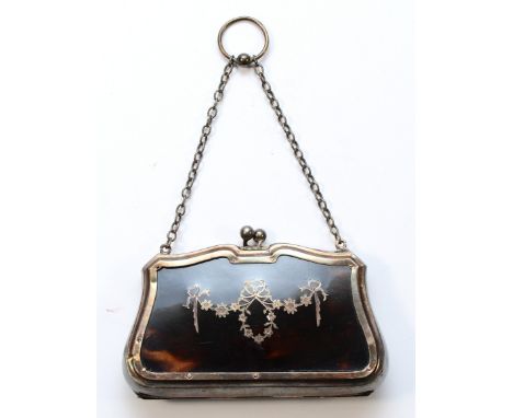 A silver and tortoise shell purse, markings worn, having leather lined interior and chain handle, 8x11cm, 106gm.