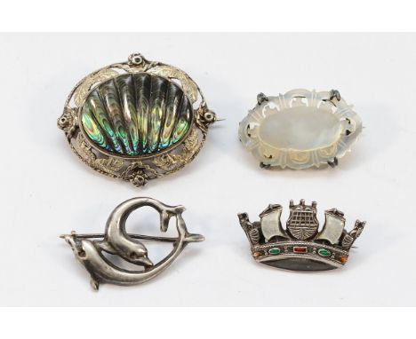 Three silver brooches to include an enamel example and an abalone shell example, with an unmarked silver mother of pearl broo