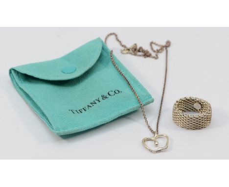 Tiffany &amp; Co, Elsa Peretti, a 925 silver apple shaped pendant on a chain, with a Tiffany &amp; Co, 925 silver mesh ring, 
