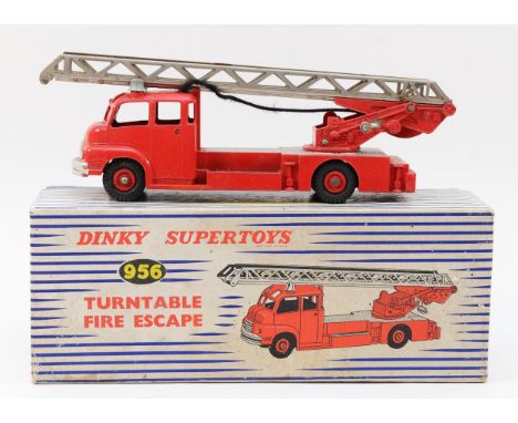 Dinky Supertoys; A Dinky Turntable Fire Escape Engine comprising red and silver body, red plastic hubs, steel ladder, in orig