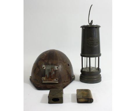 A vintage miners safety helmet hard hat; texolex Malcolm Campbell, together with a Ferndale coal &amp; mining Co brass miners