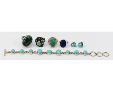 A 925 silver mounted turquoise bracelet, 18cm, with matching earrings, three unmarked silver and turquoise rings, P-T, and an