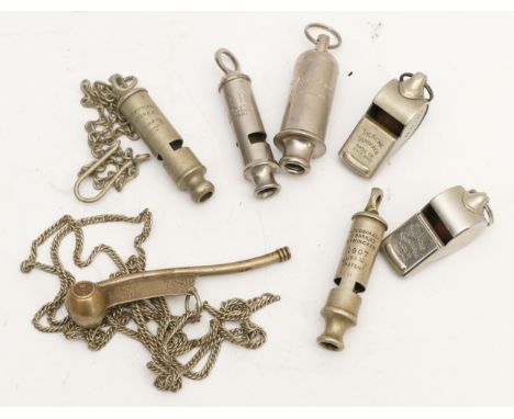 A collection of seven whistles, to include a 1907 Hudson, stamped with the broad arrow, Naval Bosun and the Acme Thunderer.