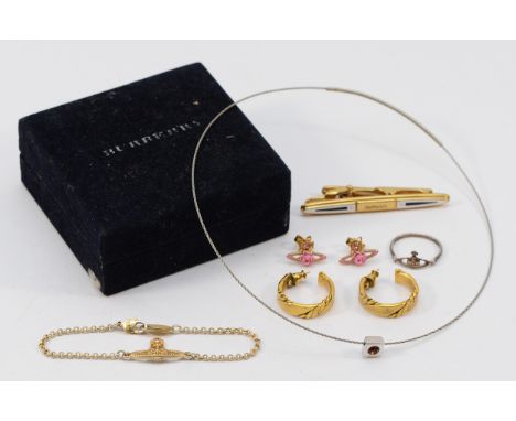 Vivienne Westwood, a pair of gilt metal gemset earrings with scroll backs, a Vivienne Westwood 925 silver ring, O, a Vivienne