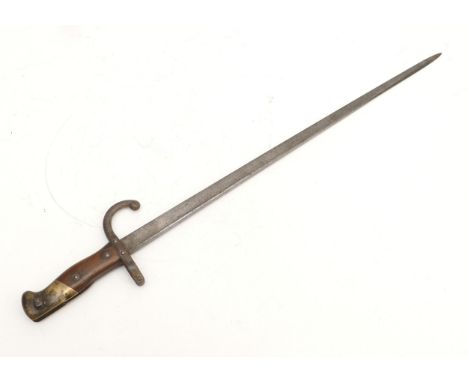 A late 19th century French 'Gras' pattern bayonet, patented L 50297, etched 1879 on the blade, with scabbard, 52cm.