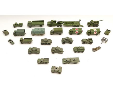 A collection of over twenty playworn Dinky and Corgi military related diecast model vehicles to include, armoured cars, ambul