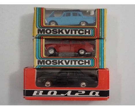 A group of 1:43 scale Russian made (USSR) diecast model cars, comprising of a 1967 Moskvich 412, a 1969 Moskvich 412 estate a