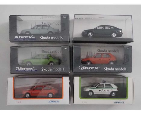 A group of 1:43 scale models by ABREX comprising of 1980s  and1990s Skoda automobiles to include a 1984 Skoda 120L and a 1994