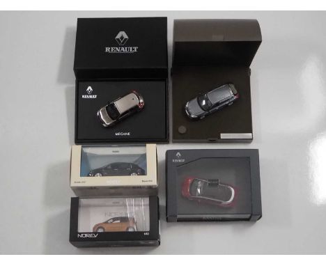 A group of 1:43 scale models by NOREV, comprising of Renault automobiles to include a 2000 Renault Aventime and a 2001 Renaul