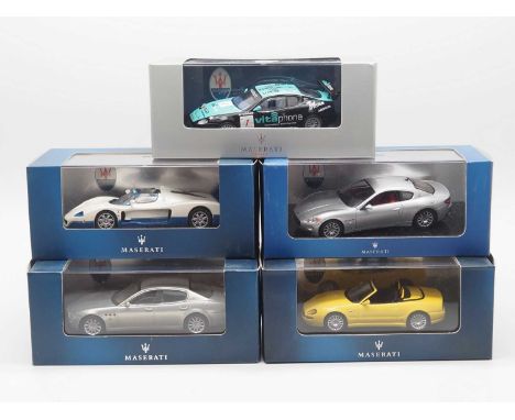 A group of 1:43 scale models by IXO, comprising of Maserati automobiles to include a 2001 Maserati Spyder Cambiocorsa and a 2