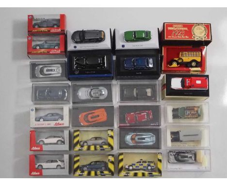 A group of boxed and unboxed 1:43 scale models to include SCHUCO Junior Line, MATCHBOX Models of Yesteryear and CARAMANIA, co