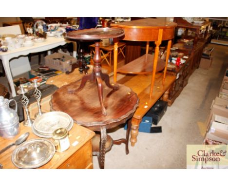 A 19th Century mahogany tripod table with galleried top; and an Edwardian mahogany occasional table 