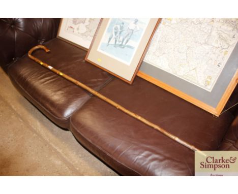 A rustic shepherds crook walking stick 
