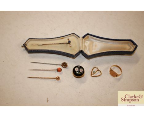 A diamond set stick pin, three others, a 9ct gold ring, brooch button etc. 