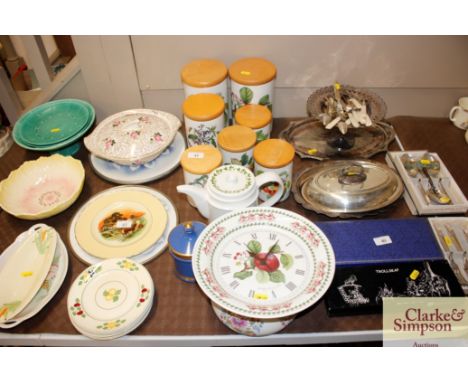 A quantity of Portmeirion storage jars, clock, chamber pot etc.