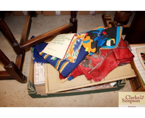 A box of miscellaneous items to include a 19th Century print; various other prints, some unframed; decorative fabrics etc