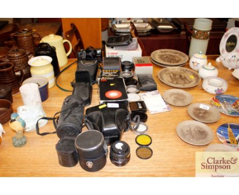 A quantity of various camera equipment 