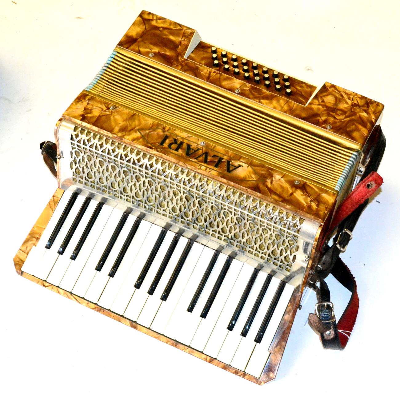 A Small German Alvari Accordion, with faux pearl covered body, cased