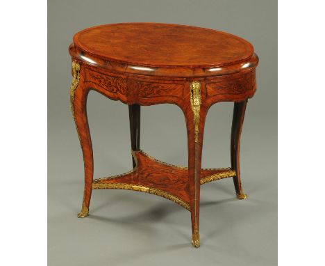 A large Victorian walnut and scroll marquetry combined table and jardiniere stand, with oval top lifting to a painted tin int