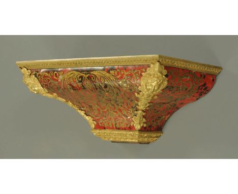A 19th century boulle marquetry clock bracket, large form.  Width 66 cm, depth 26 cm.   CONDITION REPORT:  The length of the 