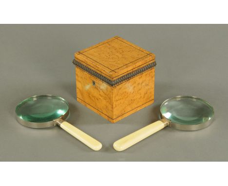 A Victorian maple tea caddy, and two magnifying glasses.  