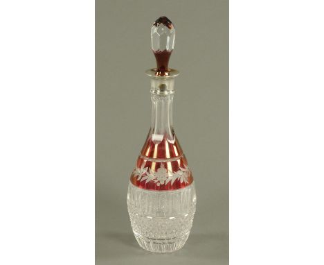 A silver mounted ruby flash decanter, with stopper, London 1980.