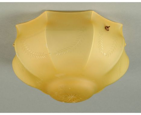 A 1930's amber coloured glass lamp shade, with suspensions chains. 