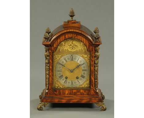 An Edwardian simulated rosewood mantle clock, with two-train striking movement by Aird & Thomson, Glasgow.  Width 25.5 cm, he