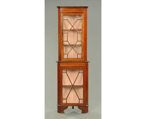 An Edwardian inlaid mahogany standing corner cabinet, narrow proportions, raised on bracket feet.  Width 55 cm.    CONDITION 