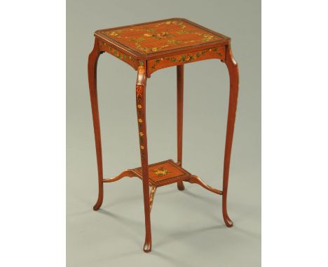 An Edwardian painted satinwood occasional table, raised on cabriole legs and with low shelf.  Width 34 cm. 