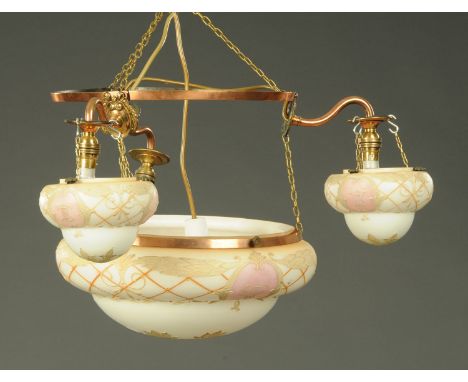 An Edwardian glass light shade and fittings, and a coloured glass light shade and small chandelier.  