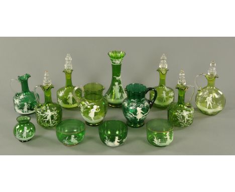 A collection of 13 pieces of Victorian green Mary Gregory type glassware, comprising two pairs of decanters, two jug decanter