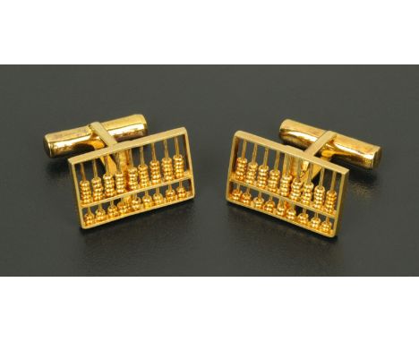 A pair of 1950's Chinese export gilt silver abacus cufflinks.     CONDITION REPORT:  They are both marked Sterling.