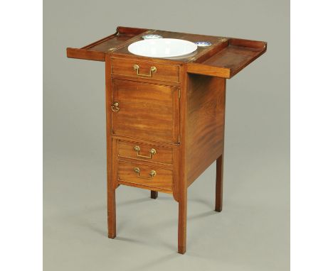 A George III Gillows style rectangular washstand, with folding top, cupboard and single drawer modelled as two, raised on leg
