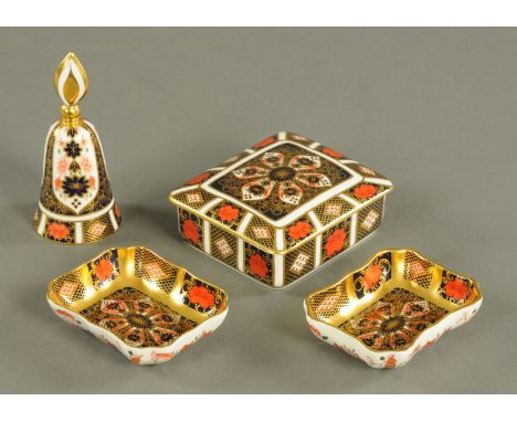 A Royal Crown Derby snuffer, cased, a pair of pin dishes and lidded trinket box.   CONDITION REPORT:  The bell has a slightly