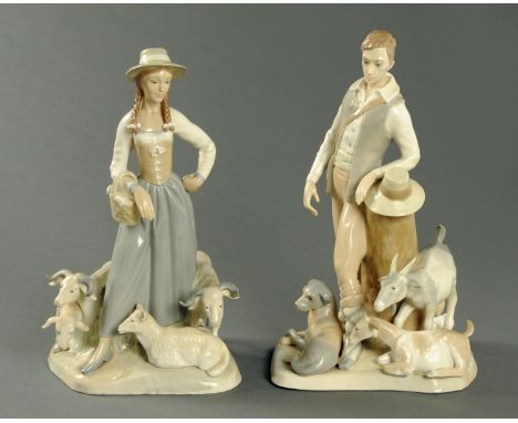 A large pair of LLadro style figurines.  Height 41 cm. 
