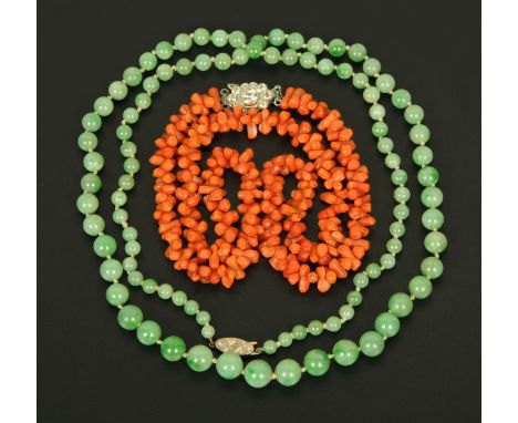 A coral necklace, and a jade necklace.   CONDITION REPORT:  The jade beads are approx 4 mm in diameter to 9 mm.  It has a whi