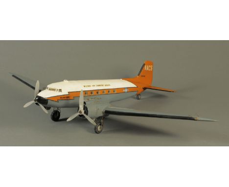 A scratch built model of a Douglas DC3 Dakota Military Air Transport aeroplane, with glow-plug engines, wire controlled, circ