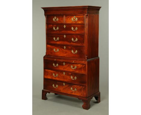 A George III mahogany tallboy, in two sections, the top half with a moulded Greek key cornice above two short and three long 