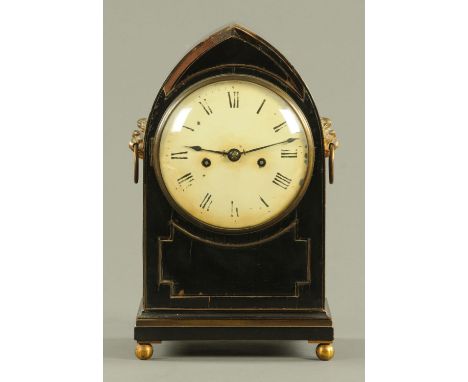 A Regency ebonised lancet bracket clock by Handley & Moore of Clerkenwell London, with twin fusee movement.  Height 34 cm, wi