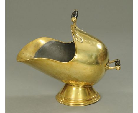 A Victorian brass helmet coal receiver, with two carrying handles.