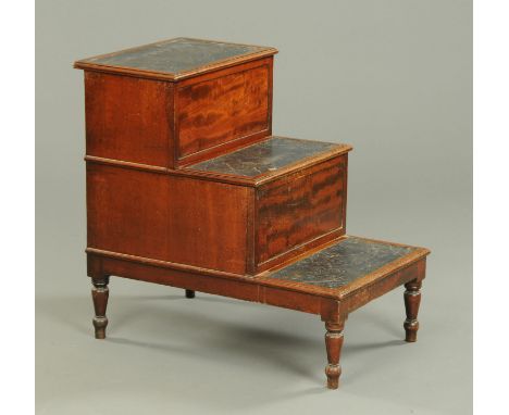 A Regency mahogany step commode, three tread, with turned legs. Width 48 cm. 