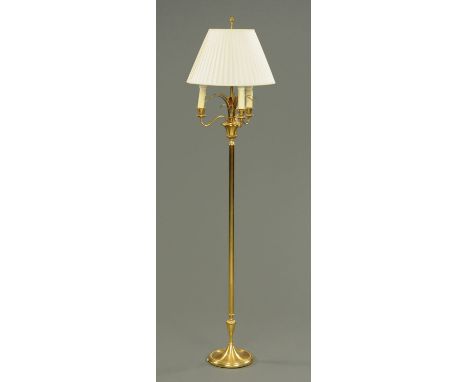 A Hollywood regency gilded brass pineapple leaf standard lamp. 