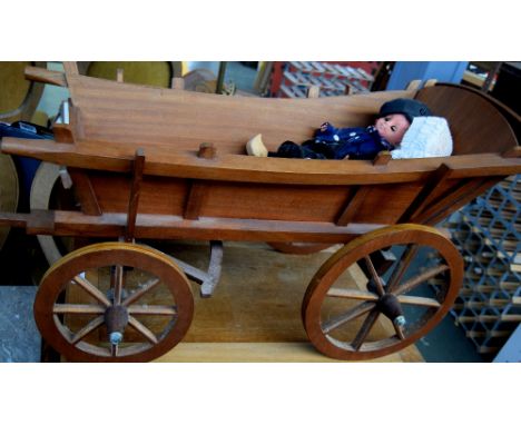 Vintage doll's carriage with two dolls, 91 cm width