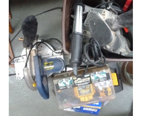 A selection of power tools, including a belt sander, and other items