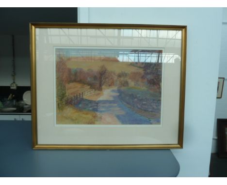 A print of a country lane in the evening light, framed and glazed, signed 'PD' bottom right, 33 x 46cm