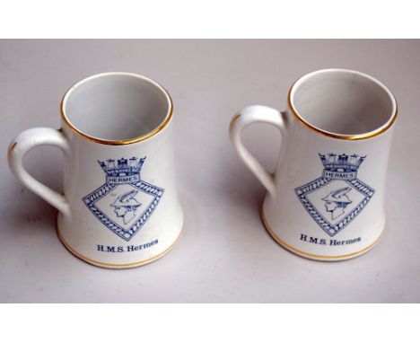 A pair of H.M.S. Hermes beer steins, 13 cmH