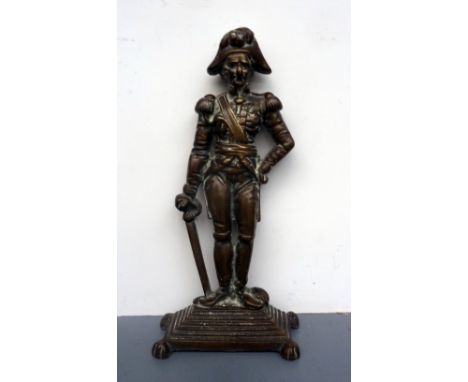 A metal door stop in the form of a full length portrait of Admiral Nelson, 32cmH